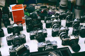 High angle view of cameras on display at store