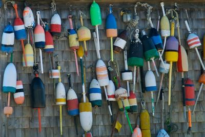 Close-up of multi colored flags hanging