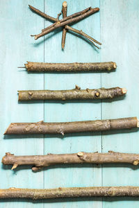 High angle view of sticks on wooden table