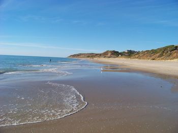 Scenic view of beach against sky