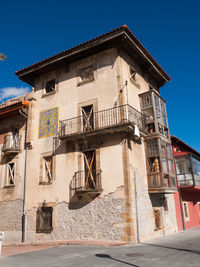 Low angle view of old building against sky