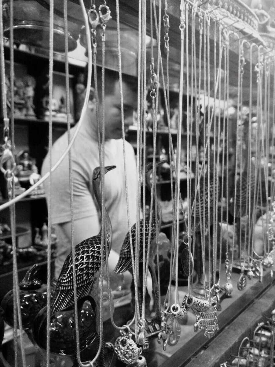 metal, focus on foreground, transportation, animal themes, day, outdoors, close-up, mode of transport, large group of objects, bird, in a row, cage, no people, abundance, metallic, selective focus, arts culture and entertainment, incidental people, high angle view