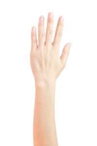 Close-up of human hand against white background