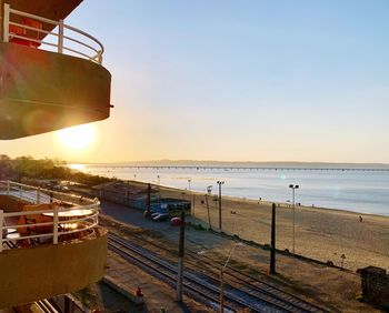 High angle view of beach against sky during sunset