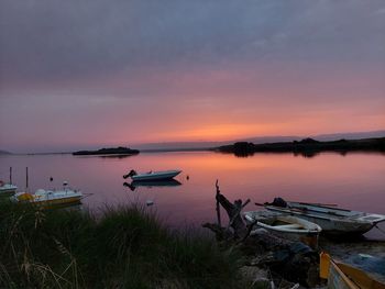 Scenic view of lake against sky during sunset