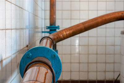 Close-up of metallic structure in bathroom