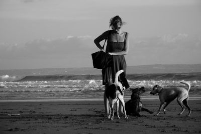 Woman standing on beach