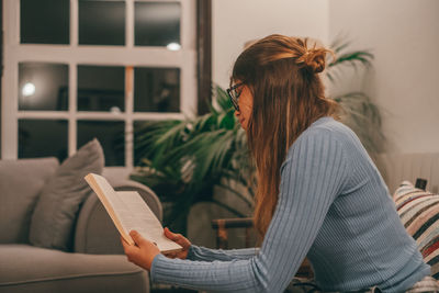 Young woman using digital tablet