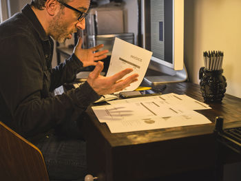 Man working on table