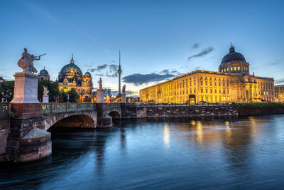 Panorama of the city palace, the cathedral and the tv tower in berlin at sunrise