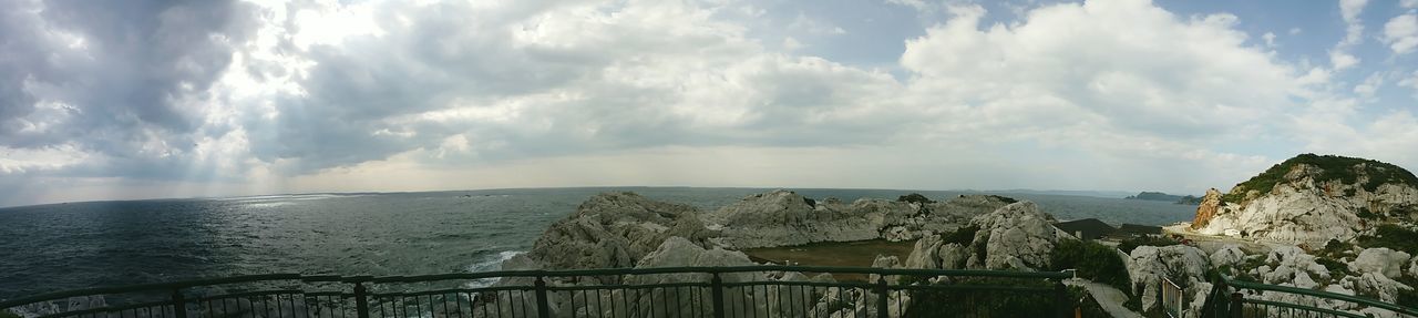 sea, horizon over water, sky, water, scenics, tranquil scene, tranquility, beauty in nature, cloud - sky, nature, rock - object, idyllic, cloud, cloudy, rock formation, beach, cliff, coastline, outdoors, remote