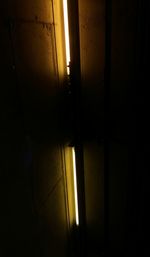Close-up of illuminated door in building