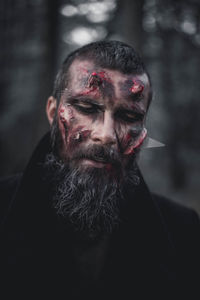 Portrait of a man in demon makeup