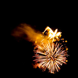 Firework display at night