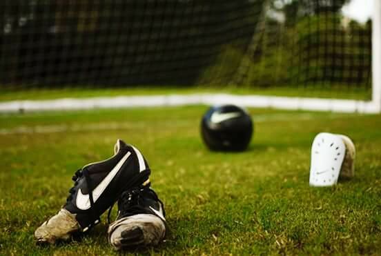 CLOSE-UP OF SOCCER BALL ON GOLF