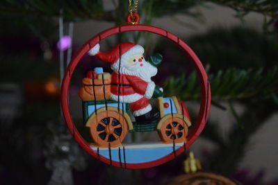 Close-up of christmas decorations on tree