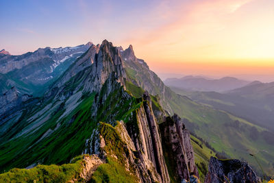 View of rocky mountains against sky