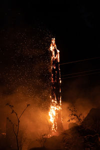 Low angle view of fire at night