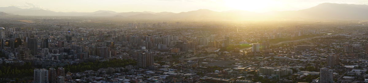 Aerial view of city during sunset