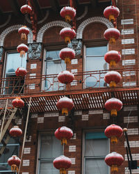 Low angle view of illuminated chandelier