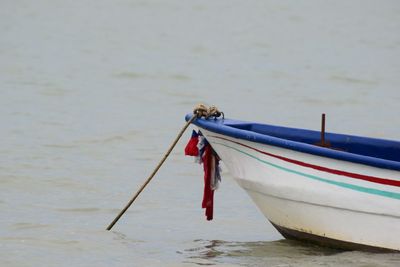 Boat moored in sea