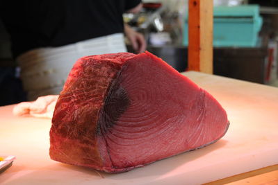 Close-up of tuna salmon on table