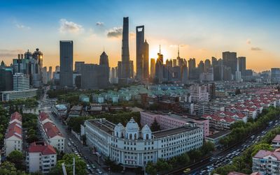 High angle view of cityscape against sky during sunset