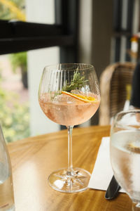 Close-up of wineglass on table