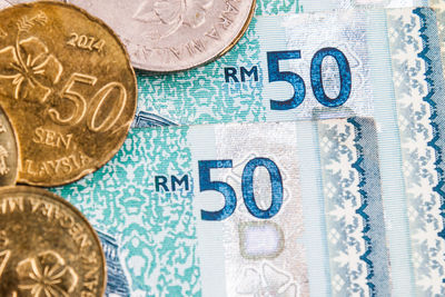 Macro shot of coins on blue background