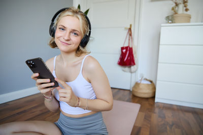 Young woman using mobile phone