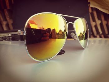 Close-up of sunglasses on table