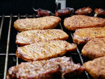 Close-up of meat on barbecue grill