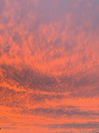 Low angle view of dramatic sky during sunset