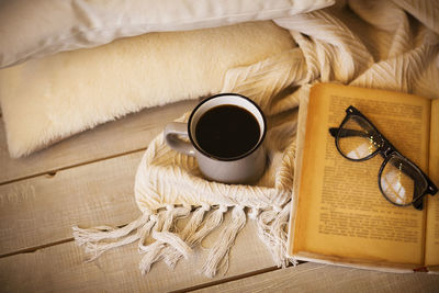 High angle view of coffee cup on table