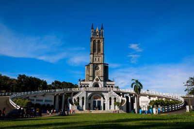 Low angle view of temple against blue sky