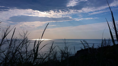 View of sea against cloudy sky