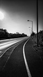 Empty road against sky