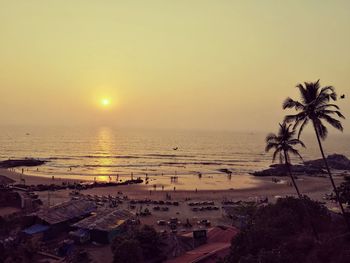 Scenic view of sea against clear sky at sunset