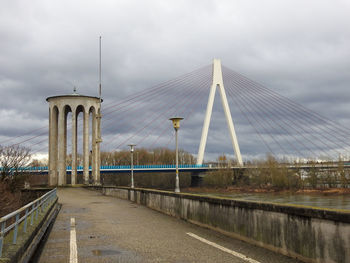 Bridge over road against sky