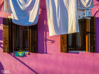 Clothes hanging on window