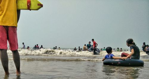 People enjoying in sea