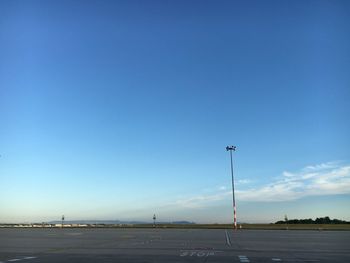 Empty road against sky