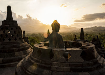 Panoramic view of temple against building