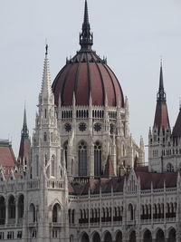 Hungarian parliament against sky in city