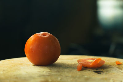 Close-up of orange fruit on table