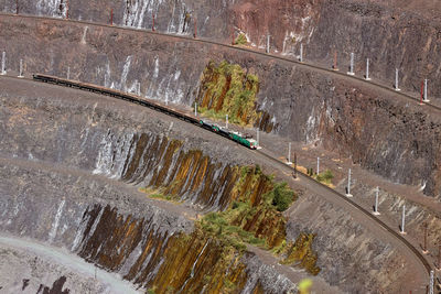 High angle view of rocks on road