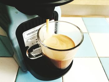 Close-up of coffee cup on table