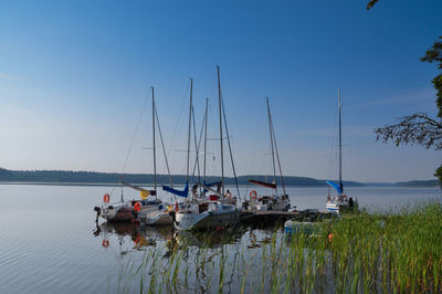 Boats in calm blue sea