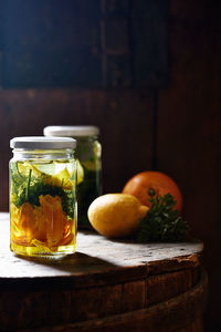 Close-up of fruits in jar on table