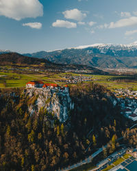 Scenic view of landscape and mountains against sky